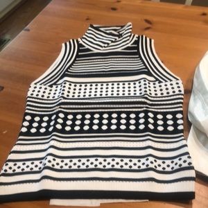 Knit sleeveless turtleneck